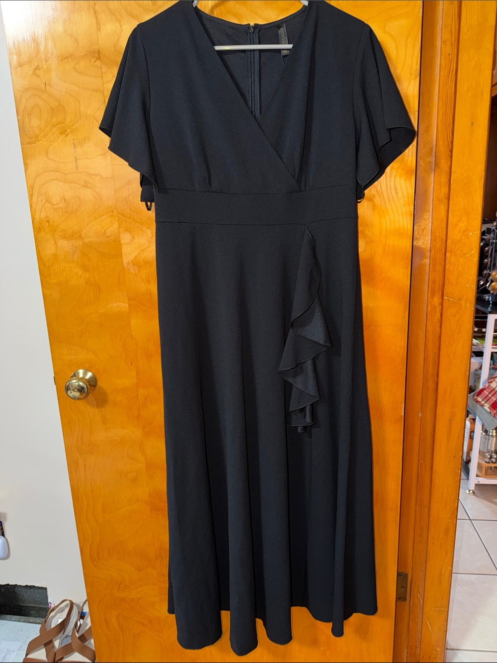 Elegant Black Maxi Dress with Flutter Sleeves and Ruffle Accent